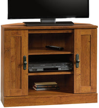 Load image into Gallery viewer, Sauder Harvest Mill Corner Entertainment Stand, For TV's up to 37", Abbey Oak finish
